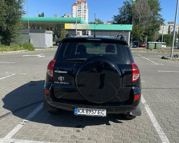 Черный Тойота РАВ 4, объемом двигателя 2 л и пробегом 187 тыс. км за 10500 $, фото 4 на Automoto.ua