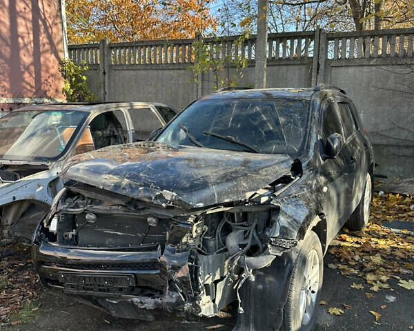 Черный Тойота РАВ 4, объемом двигателя 2 л и пробегом 200 тыс. км за 6500 $, фото 1 на Automoto.ua