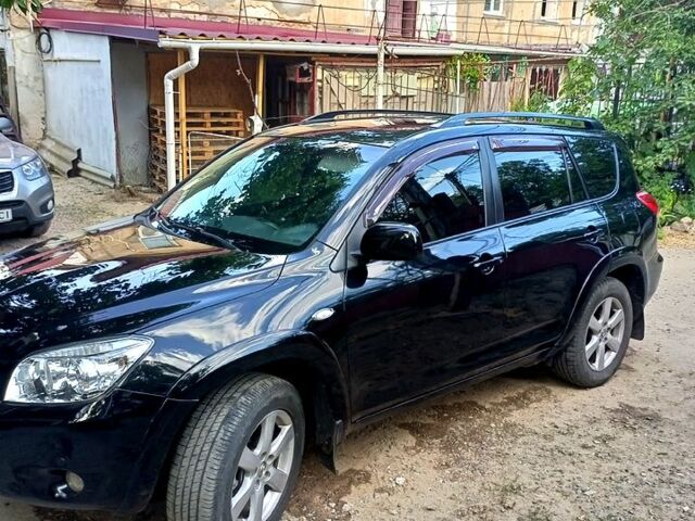 Черный Тойота РАВ 4, объемом двигателя 2.4 л и пробегом 316 тыс. км за 7800 $, фото 3 на Automoto.ua