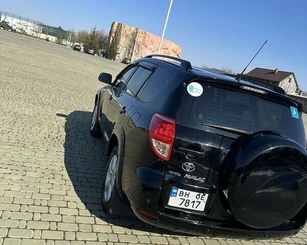 Черный Тойота РАВ 4, объемом двигателя 2.36 л и пробегом 315 тыс. км за 8200 $, фото 4 на Automoto.ua