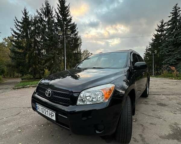 Черный Тойота РАВ 4, объемом двигателя 2.36 л и пробегом 265 тыс. км за 9499 $, фото 5 на Automoto.ua