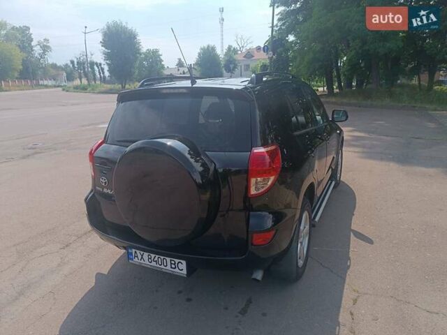Чорний Тойота РАВ 4, об'ємом двигуна 2 л та пробігом 181 тис. км за 10500 $, фото 4 на Automoto.ua