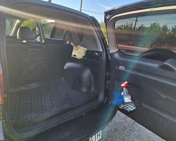 Черный Тойота РАВ 4, объемом двигателя 2 л и пробегом 264 тыс. км за 9200 $, фото 23 на Automoto.ua