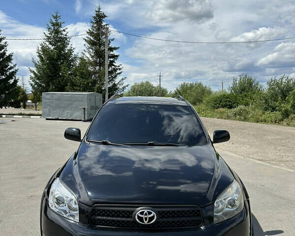 Черный Тойота РАВ 4, объемом двигателя 2.36 л и пробегом 185 тыс. км за 9600 $, фото 2 на Automoto.ua