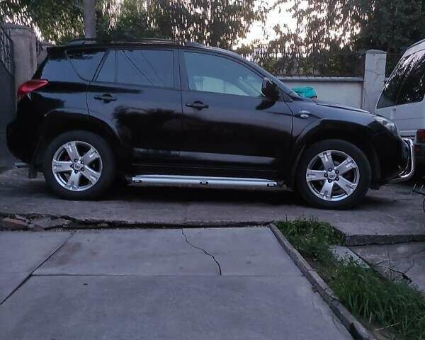 Черный Тойота РАВ 4, объемом двигателя 2.2 л и пробегом 245 тыс. км за 10999 $, фото 4 на Automoto.ua