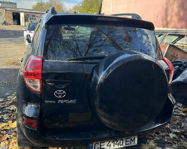 Черный Тойота РАВ 4, объемом двигателя 2 л и пробегом 200 тыс. км за 6500 $, фото 4 на Automoto.ua