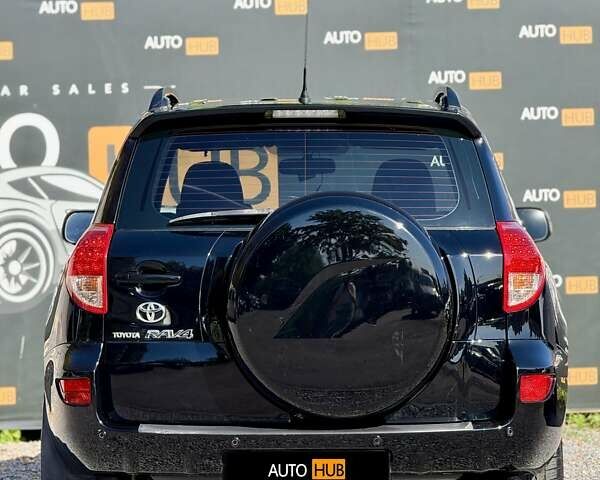 Чорний Тойота РАВ 4, об'ємом двигуна 2 л та пробігом 170 тис. км за 9900 $, фото 4 на Automoto.ua
