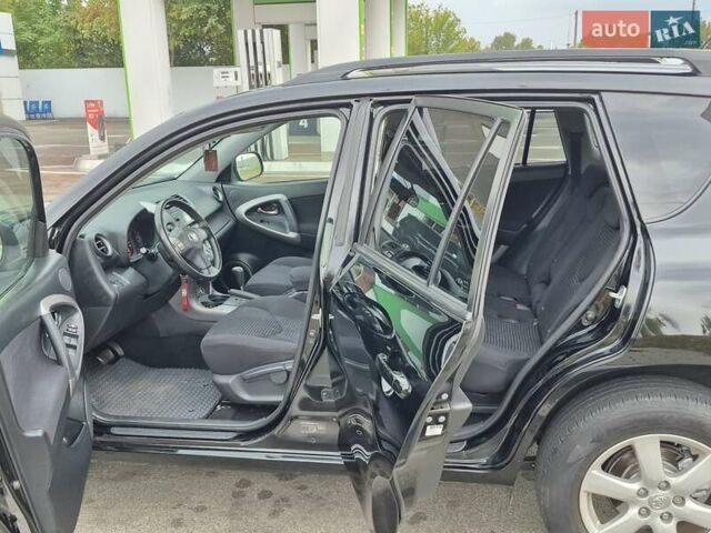 Чорний Тойота РАВ 4, об'ємом двигуна 2 л та пробігом 180 тис. км за 9700 $, фото 6 на Automoto.ua