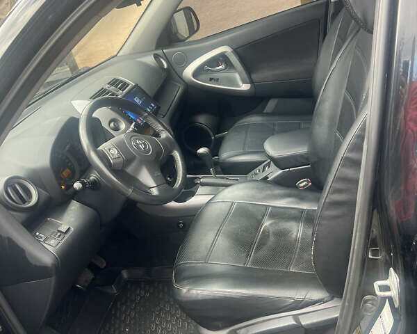 Чорний Тойота РАВ 4, об'ємом двигуна 2 л та пробігом 184 тис. км за 12000 $, фото 9 на Automoto.ua