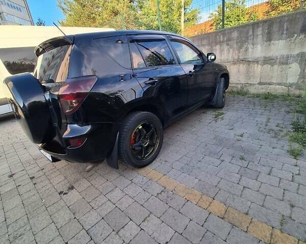 Черный Тойота РАВ 4, объемом двигателя 2 л и пробегом 264 тыс. км за 9200 $, фото 11 на Automoto.ua