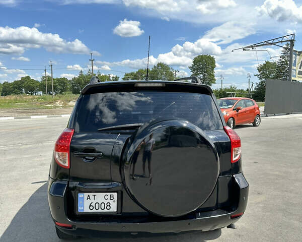 Черный Тойота РАВ 4, объемом двигателя 2.36 л и пробегом 185 тыс. км за 9600 $, фото 6 на Automoto.ua