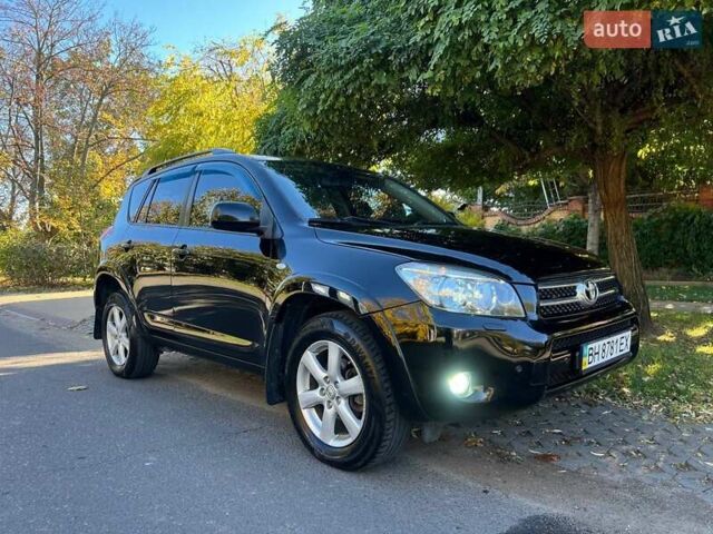 Чорний Тойота РАВ 4, об'ємом двигуна 2.36 л та пробігом 168 тис. км за 9300 $, фото 1 на Automoto.ua