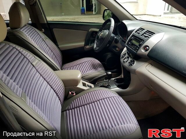 Чорний Тойота РАВ 4, об'ємом двигуна 2.4 л та пробігом 228 тис. км за 9500 $, фото 3 на Automoto.ua