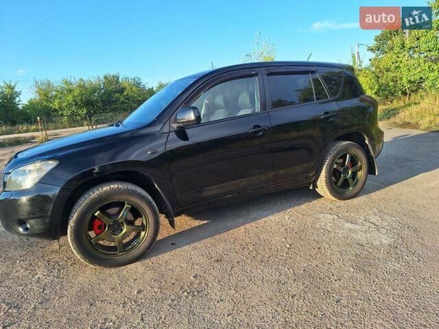 Черный Тойота РАВ 4, объемом двигателя 2 л и пробегом 264 тыс. км за 9200 $, фото 12 на Automoto.ua