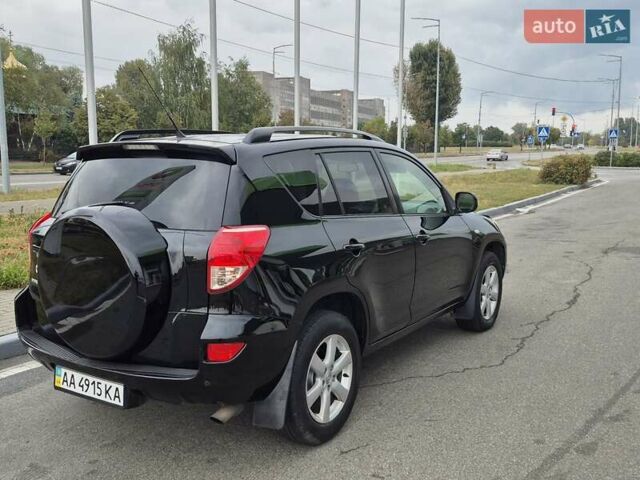 Чорний Тойота РАВ 4, об'ємом двигуна 2 л та пробігом 180 тис. км за 9700 $, фото 4 на Automoto.ua