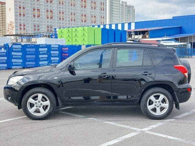 Черный Тойота РАВ 4, объемом двигателя 2 л и пробегом 237 тыс. км за 8799 $, фото 4 на Automoto.ua