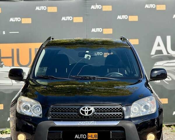 Чорний Тойота РАВ 4, об'ємом двигуна 2 л та пробігом 170 тис. км за 9900 $, фото 1 на Automoto.ua