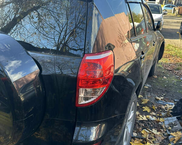 Черный Тойота РАВ 4, объемом двигателя 2 л и пробегом 200 тыс. км за 6500 $, фото 5 на Automoto.ua