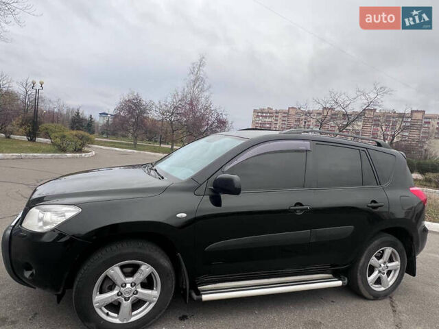 Черный Тойота РАВ 4, объемом двигателя 2 л и пробегом 248 тыс. км за 8700 $, фото 1 на Automoto.ua