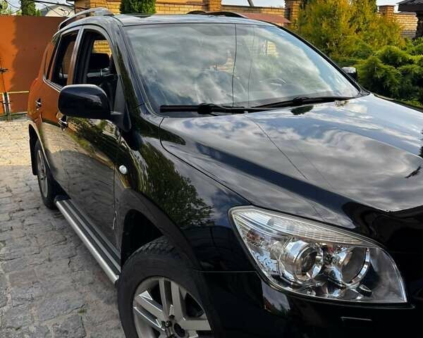 Черный Тойота РАВ 4, объемом двигателя 2 л и пробегом 178 тыс. км за 11999 $, фото 1 на Automoto.ua