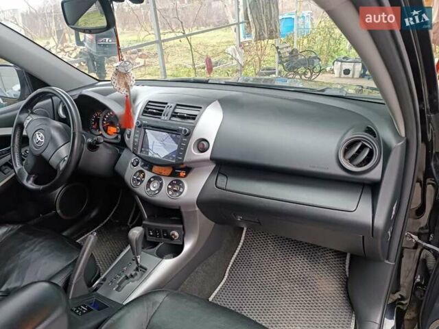 Чорний Тойота РАВ 4, об'ємом двигуна 2.36 л та пробігом 195 тис. км за 9500 $, фото 8 на Automoto.ua