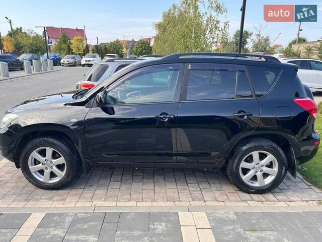 Черный Тойота РАВ 4, объемом двигателя 2 л и пробегом 180 тыс. км за 9700 $, фото 3 на Automoto.ua