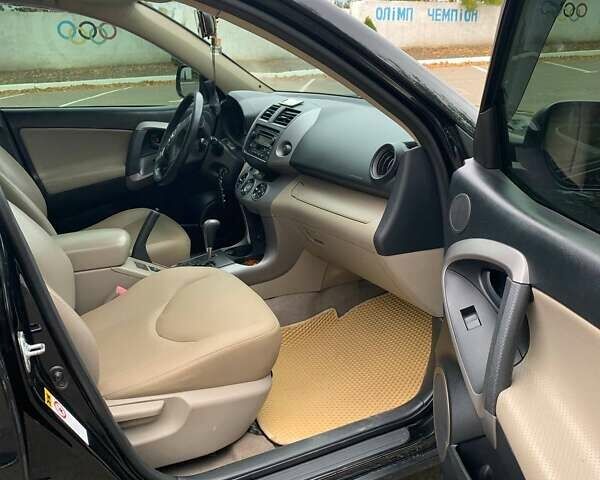 Черный Тойота РАВ 4, объемом двигателя 2.36 л и пробегом 196 тыс. км за 9500 $, фото 4 на Automoto.ua