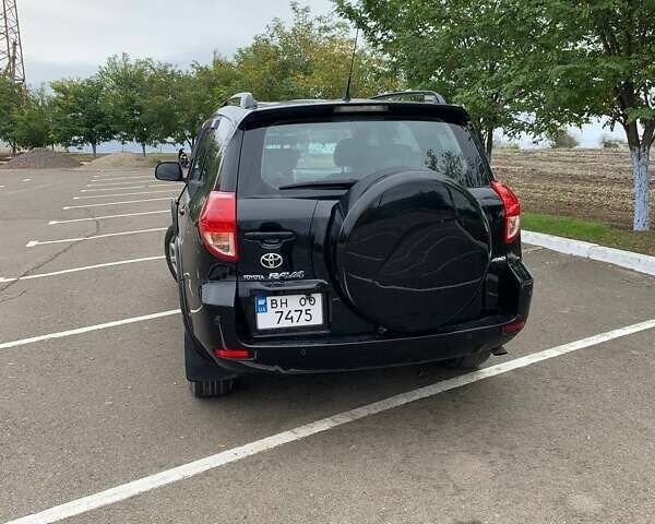 Черный Тойота РАВ 4, объемом двигателя 2.36 л и пробегом 196 тыс. км за 9500 $, фото 3 на Automoto.ua