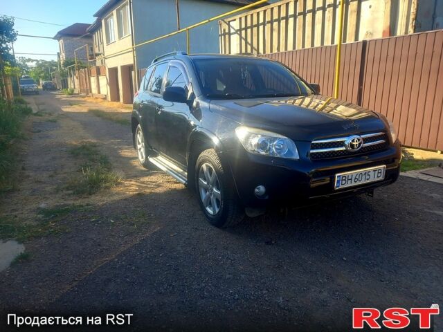 Чорний Тойота РАВ 4, об'ємом двигуна 2.4 л та пробігом 215 тис. км за 10800 $, фото 3 на Automoto.ua