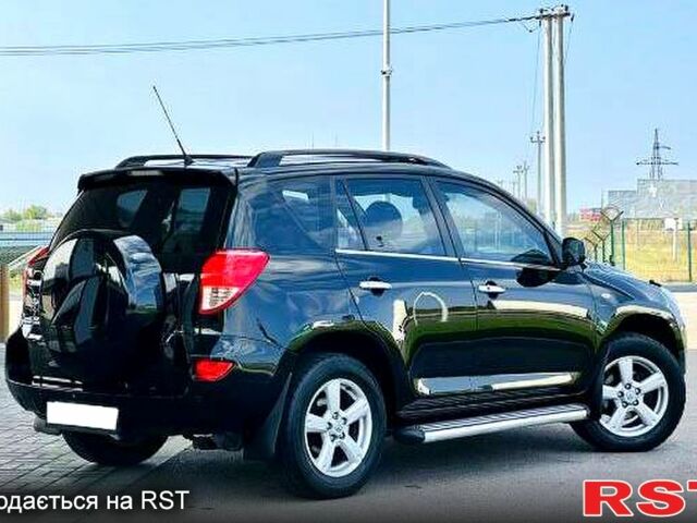 Черный Тойота РАВ 4, объемом двигателя 2 л и пробегом 200 тыс. км за 11000 $, фото 2 на Automoto.ua