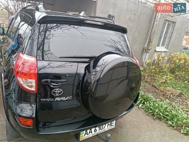 Чорний Тойота РАВ 4, об'ємом двигуна 2.36 л та пробігом 195 тис. км за 9500 $, фото 1 на Automoto.ua