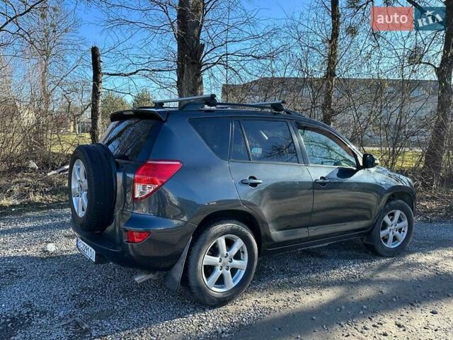 Черный Тойота РАВ 4, объемом двигателя 2 л и пробегом 248 тыс. км за 9799 $, фото 2 на Automoto.ua