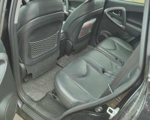 Черный Тойота РАВ 4, объемом двигателя 2.23 л и пробегом 205 тыс. км за 9700 $, фото 3 на Automoto.ua