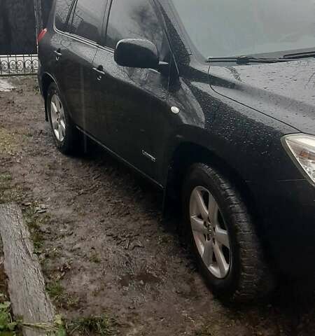 Черный Тойота РАВ 4, объемом двигателя 2.4 л и пробегом 317 тыс. км за 9500 $, фото 1 на Automoto.ua