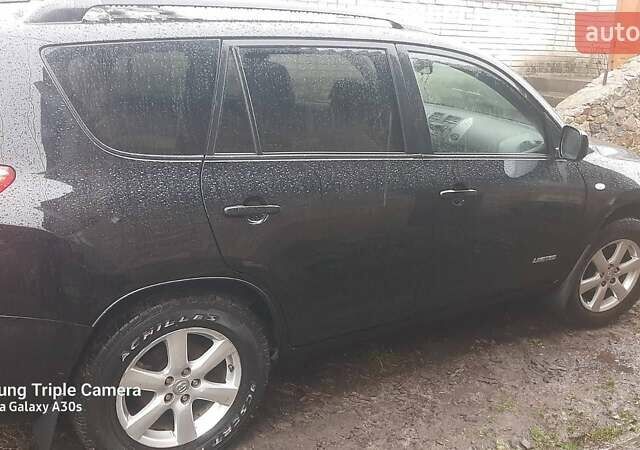 Черный Тойота РАВ 4, объемом двигателя 2.4 л и пробегом 317 тыс. км за 9500 $, фото 5 на Automoto.ua