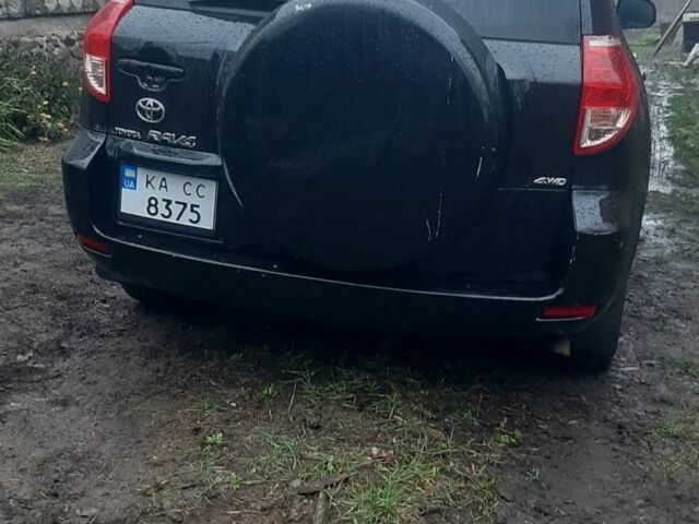 Черный Тойота РАВ 4, объемом двигателя 2.4 л и пробегом 317 тыс. км за 9500 $, фото 4 на Automoto.ua