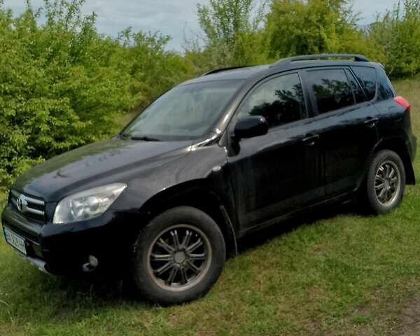 Черный Тойота РАВ 4, объемом двигателя 2 л и пробегом 231 тыс. км за 9900 $, фото 5 на Automoto.ua