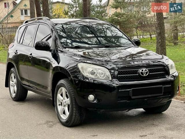 Чорний Тойота РАВ 4, об'ємом двигуна 2 л та пробігом 176 тис. км за 10750 $, фото 2 на Automoto.ua