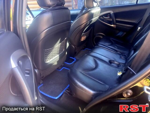 Чорний Тойота РАВ 4, об'ємом двигуна 2.4 л та пробігом 215 тис. км за 10800 $, фото 6 на Automoto.ua