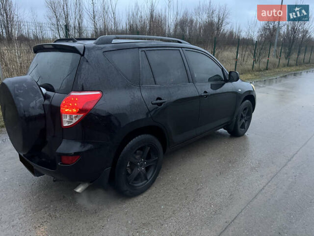 Чорний Тойота РАВ 4, об'ємом двигуна 2 л та пробігом 270 тис. км за 8500 $, фото 3 на Automoto.ua