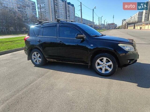 Чорний Тойота РАВ 4, об'ємом двигуна 2 л та пробігом 233 тис. км за 8700 $, фото 2 на Automoto.ua