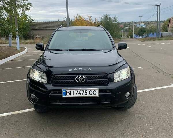 Черный Тойота РАВ 4, объемом двигателя 2.36 л и пробегом 196 тыс. км за 9500 $, фото 2 на Automoto.ua
