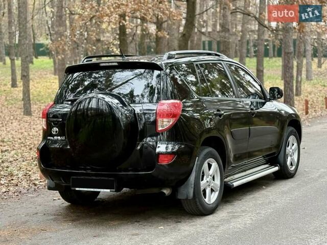 Чорний Тойота РАВ 4, об'ємом двигуна 2 л та пробігом 177 тис. км за 10999 $, фото 6 на Automoto.ua