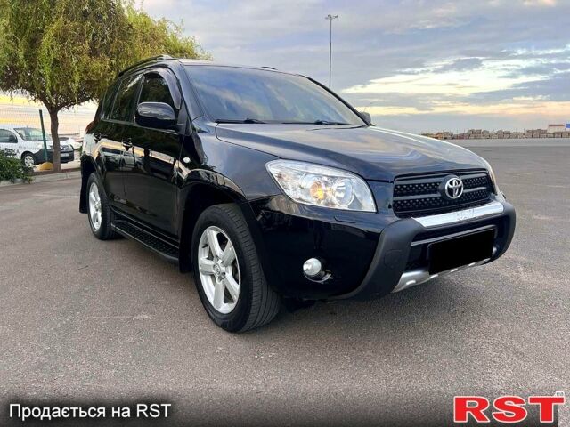 Черный Тойота РАВ 4, объемом двигателя 2 л и пробегом 275 тыс. км за 10800 $, фото 1 на Automoto.ua