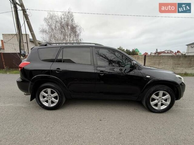 Черный Тойота РАВ 4, объемом двигателя 2.4 л и пробегом 173 тыс. км за 10500 $, фото 3 на Automoto.ua