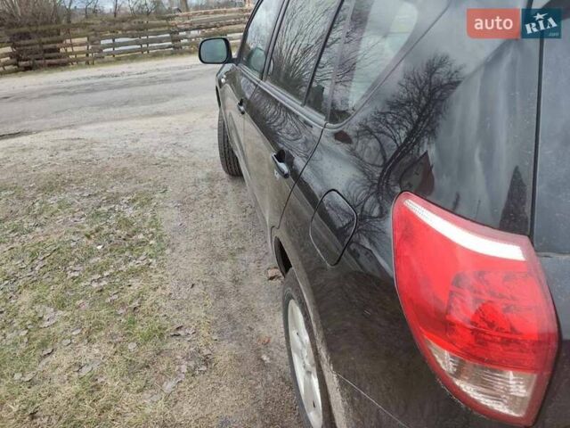 Черный Тойота РАВ 4, объемом двигателя 2.23 л и пробегом 205 тыс. км за 9700 $, фото 7 на Automoto.ua