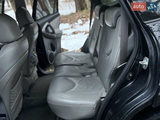 Черный Тойота РАВ 4, объемом двигателя 2.36 л и пробегом 268 тыс. км за 7400 $, фото 52 на Automoto.ua