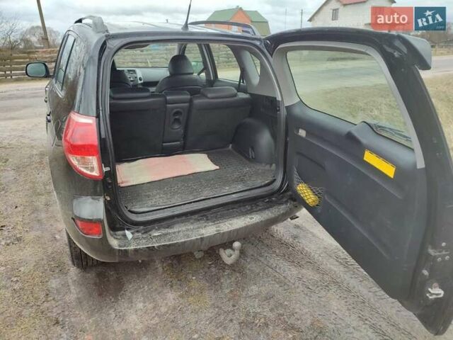 Черный Тойота РАВ 4, объемом двигателя 2.23 л и пробегом 205 тыс. км за 9700 $, фото 5 на Automoto.ua