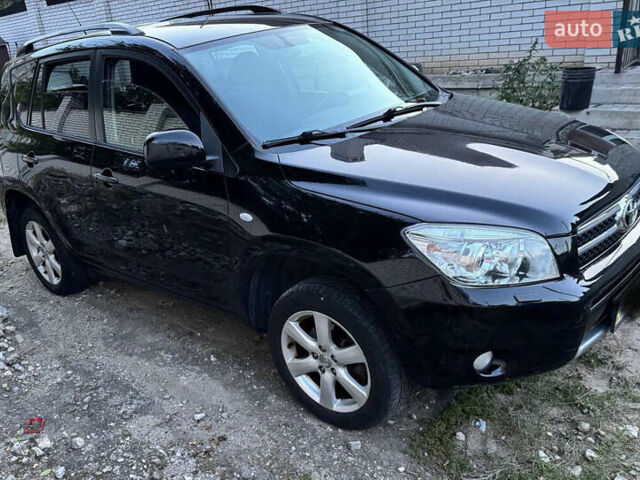 Черный Тойота РАВ 4, объемом двигателя 2 л и пробегом 151 тыс. км за 9800 $, фото 5 на Automoto.ua