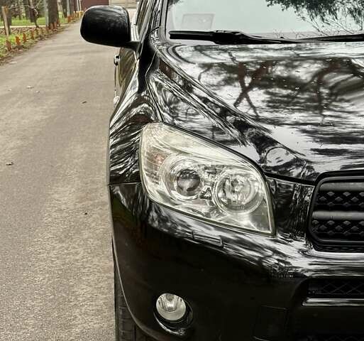 Чорний Тойота РАВ 4, об'ємом двигуна 2 л та пробігом 177 тис. км за 10999 $, фото 9 на Automoto.ua